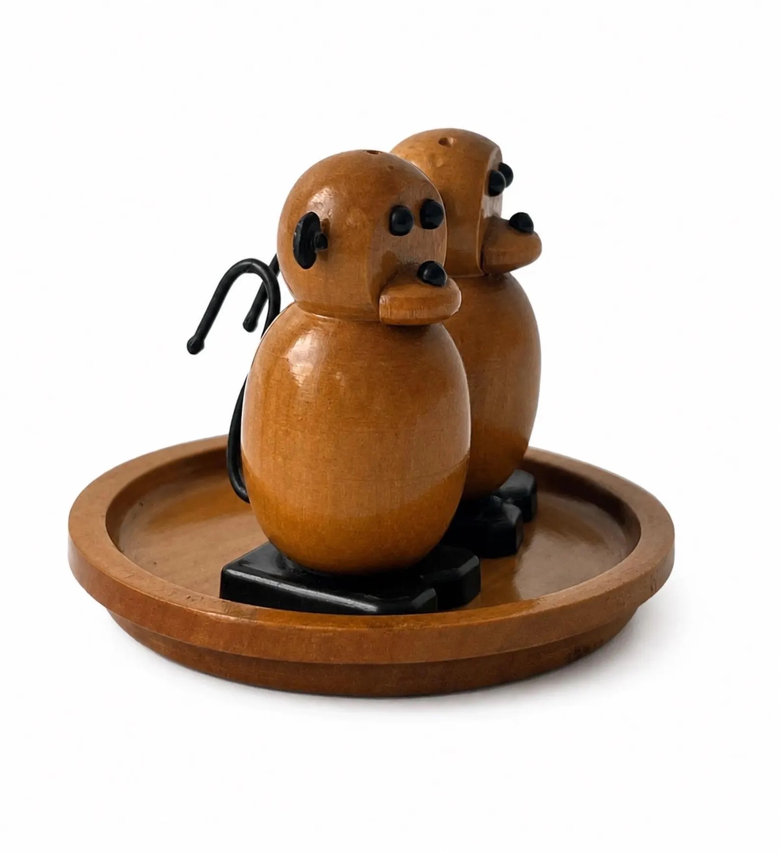 Wooden monkey salt and pepper shakers on a tray